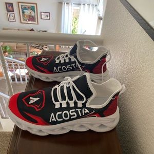 Shoes with the name Acosta on then